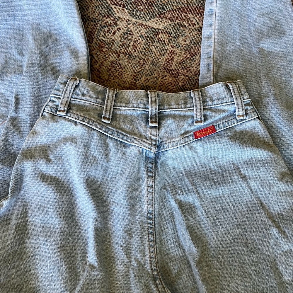 Vintage light wash Wranglers